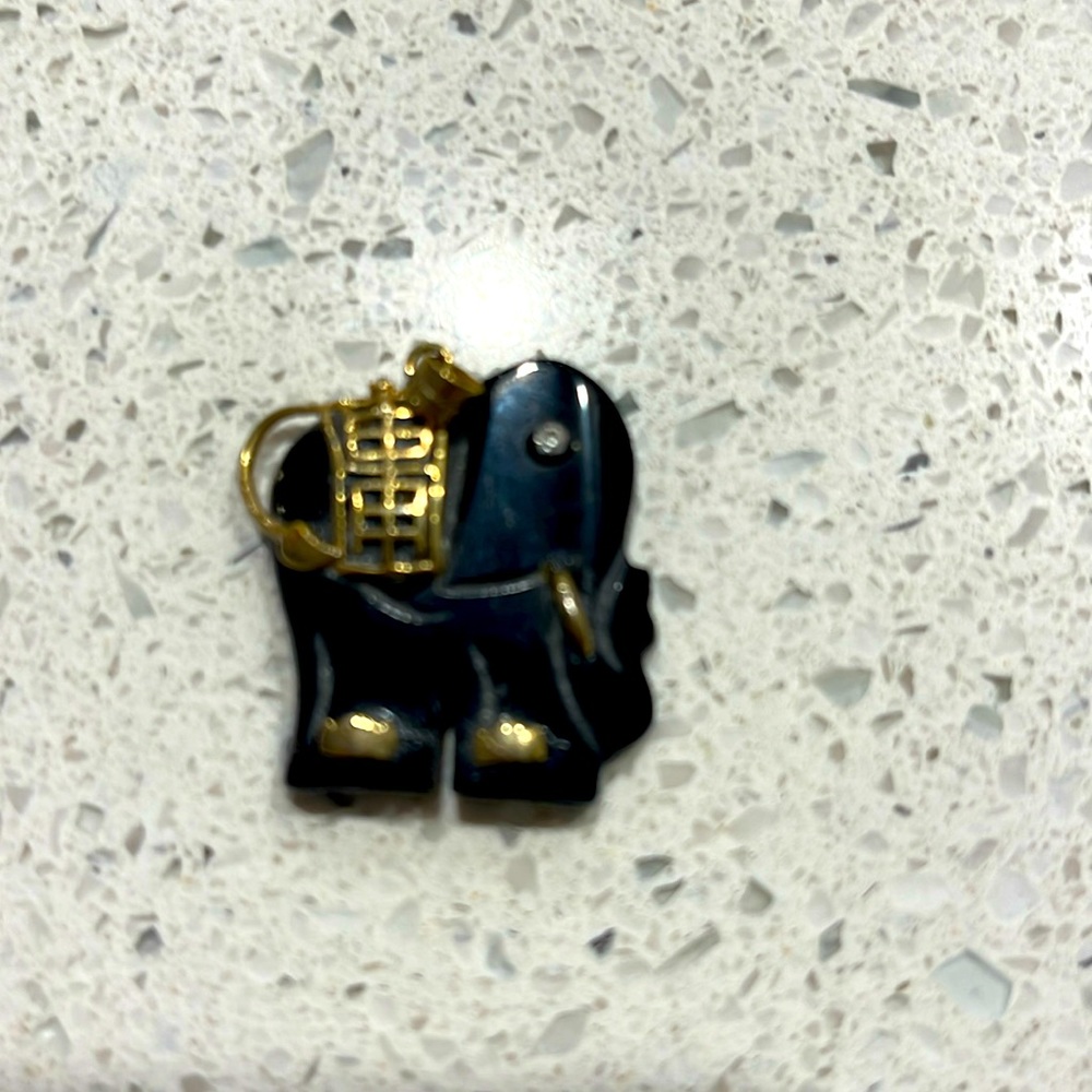 Hematite pendant with gold trim